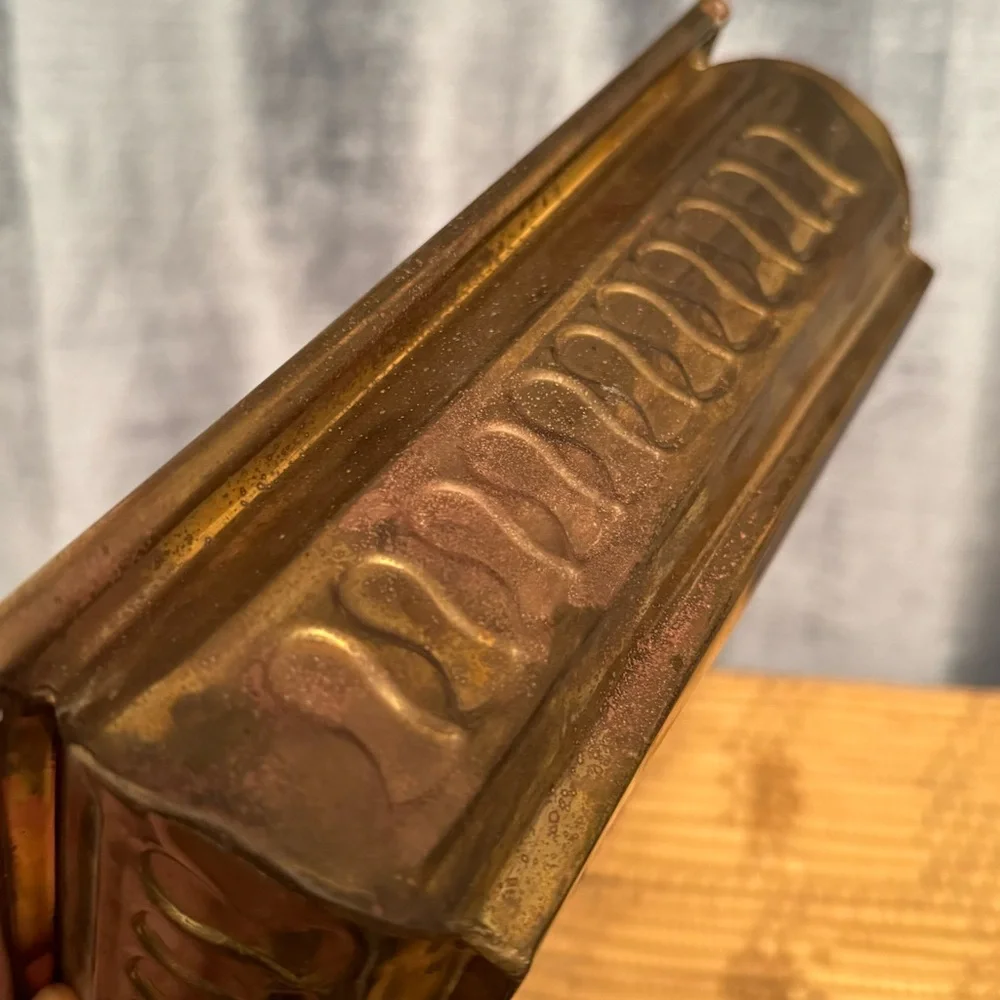vintage brass planter, also known as a jardinière or cachepot.